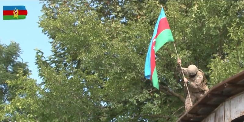 Azerbaijani flag waving in liberated from occupation territories of Jabrayil