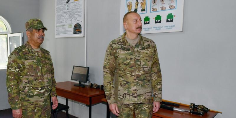 President Ilham Aliyev viewed conditions created at one of commando military units of Ministry of Defense, and presented battle flag to military unit