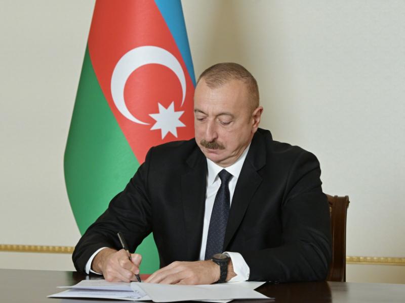President Ilham Aliyev awards media representatives
