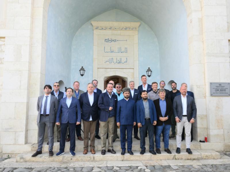 International travelers tour historical sites in Aghdam
