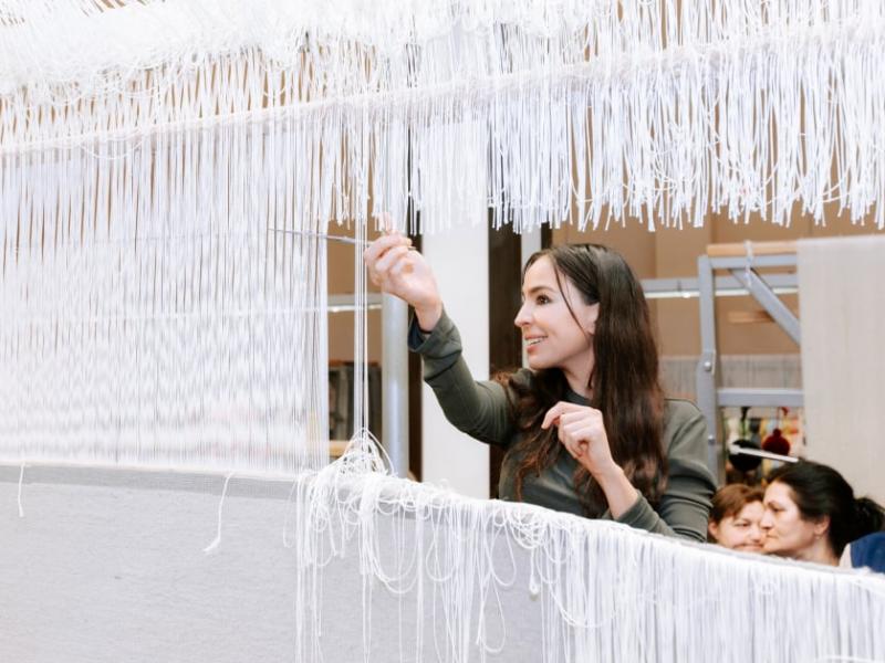 Cutting ceremony held for circular hand-woven carpet created by 